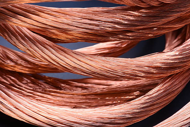 Closeup of copper wire, concept of industry development Closeup of copper wire, concept of industry development and market of raw materials electromagnetic induction stock pictures, royalty-free photos & images