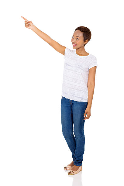 istock african woman pointing at empty space 508875338