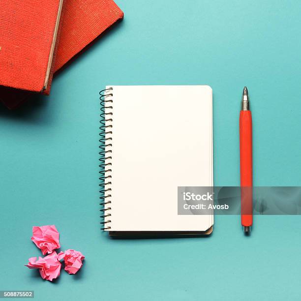 Office Desk Table With Supplies And Crumpled Paper Top View Stock Photo - Download Image Now