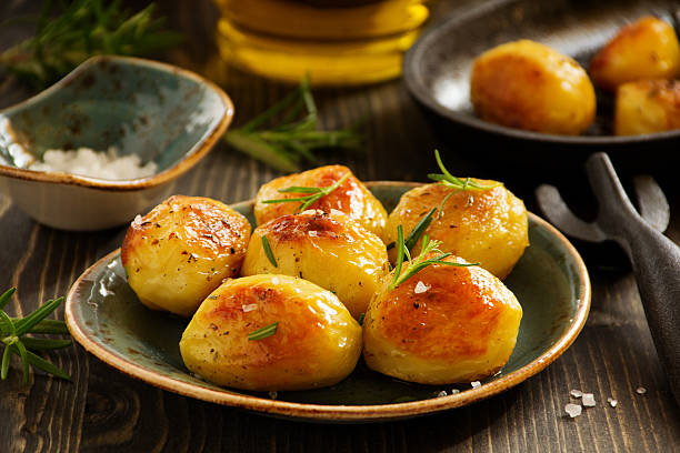 istock Baked potatoes with rosemary. 508876764