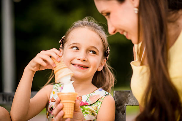 istock Mother and child enjoying icecream 508877366