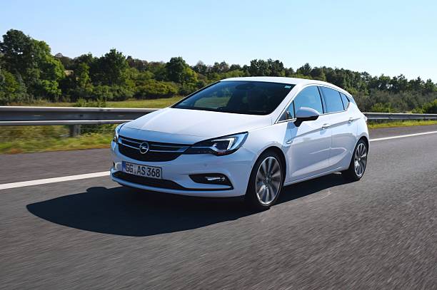 Bratislava, Slovakia - 1st October, 2015: Opel Astra driving on the highway during the press launch. The first generation of Astra was debut in 1991 on the market. This model is the most popular car from Opel on the European market.