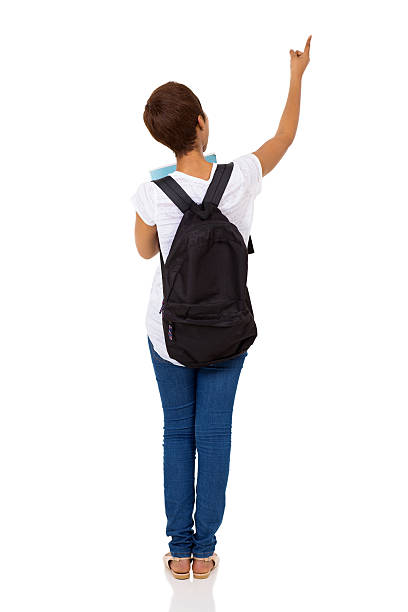 istock african college girl pointing empty space 508881420
