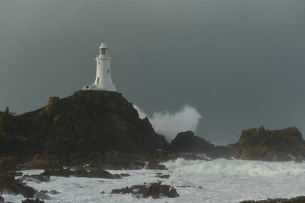 istock La Corbiere lighthouse, Jersey, U.K.  Storm Imogen. 508881776