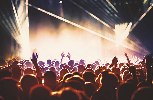 istock People at concert party. 508881842