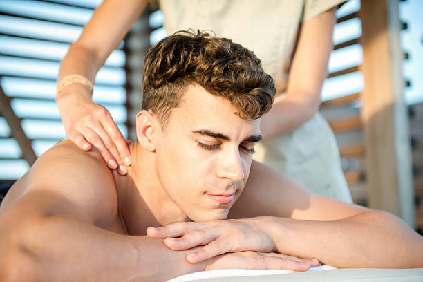 istock Handsome Man Enjoying Massage At Spa Outdoors, Sunset, Mediterranean, Europe 508884115