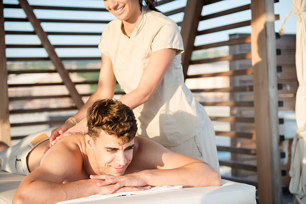 istock Handsome Man Enjoying Massage At Spa Outdoors, Sunset, Mediterranean, Europe 508884123
