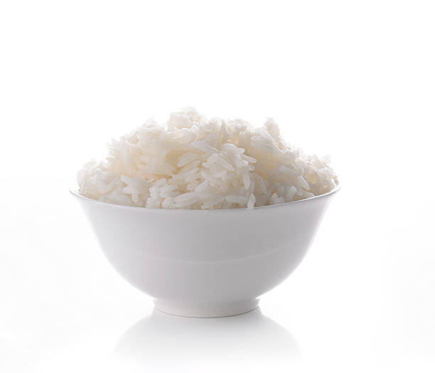 istock bowl full of rice on white background 508884128