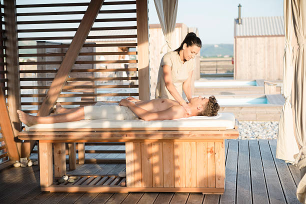 istock Handsome Man Enjoying Massage At Spa Outdoors, Sunset, Mediterranean, Europe 508884187