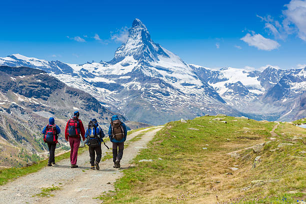 istock group of people with backpacks walking along the trail 508884221