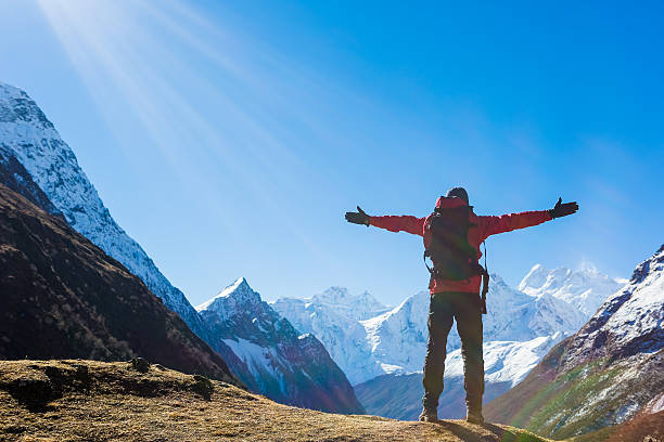 istock hiker enjoy summer day in Himalayas mountains 508884233