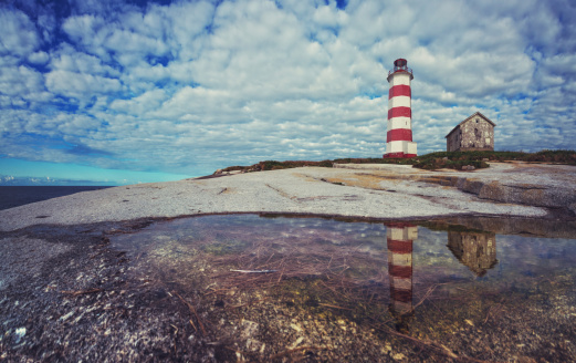 Red and white lighthouse of Lège Cap Ferret, in the Bassin d'Arcachon, in Gironde