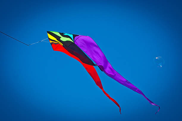 istock Kite and Soap Bubble in the sky 508886157