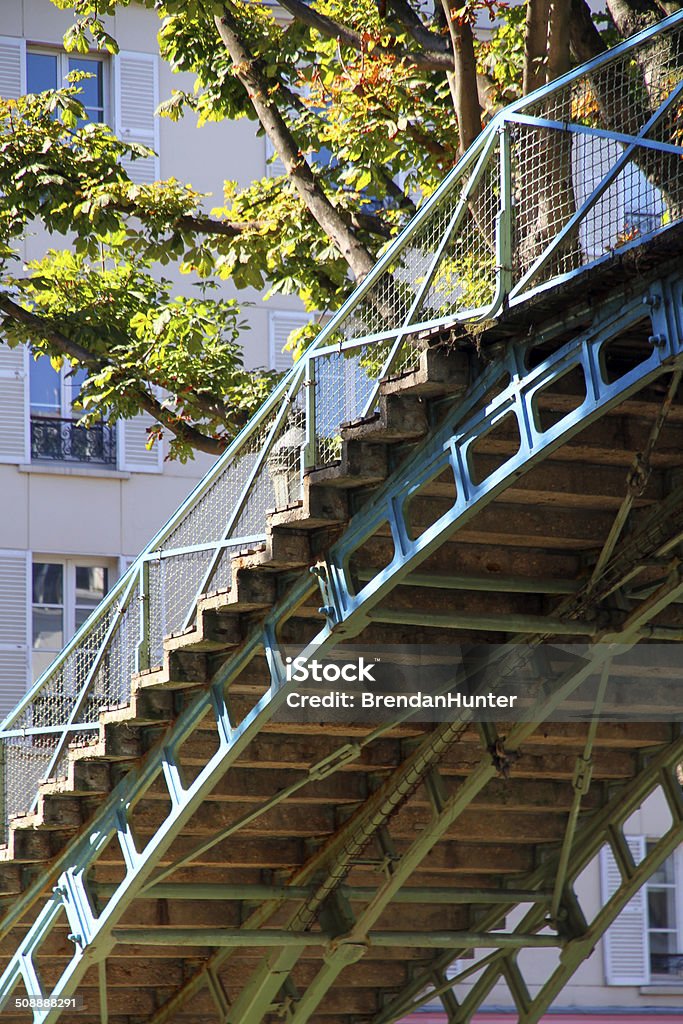 Climb An iron bridge along the Canal Saint Martin in Paris. Canal St Martin Stock Photo