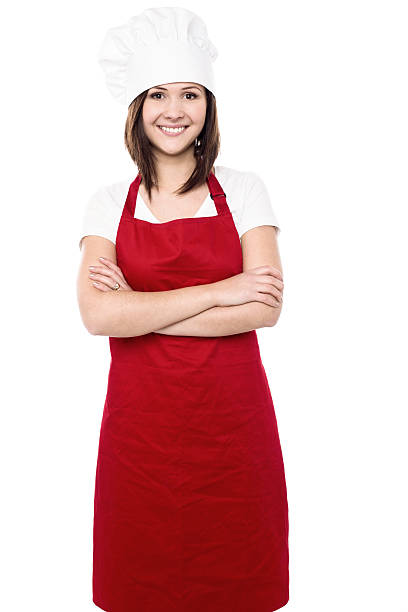 istock Young female chef with folded arms 508888393