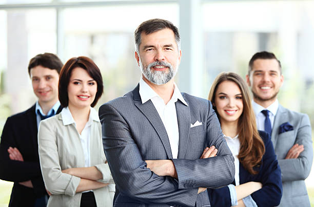 istock Happy smiling business team in office 508888461