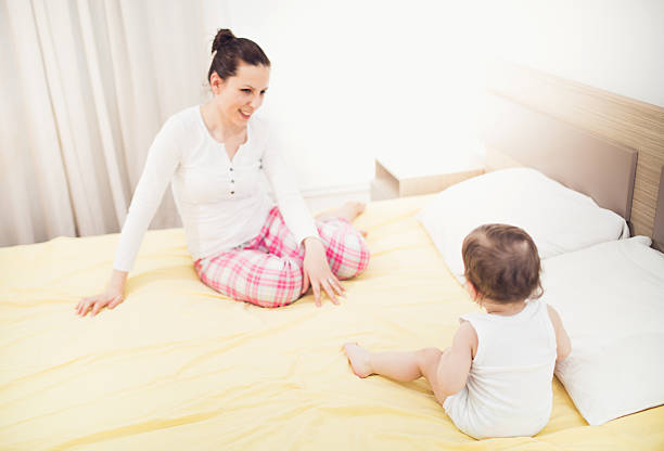 istock Boy with his young mother in bed 508893508