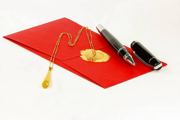 istock Golden necklace and a red envelope 508893600
