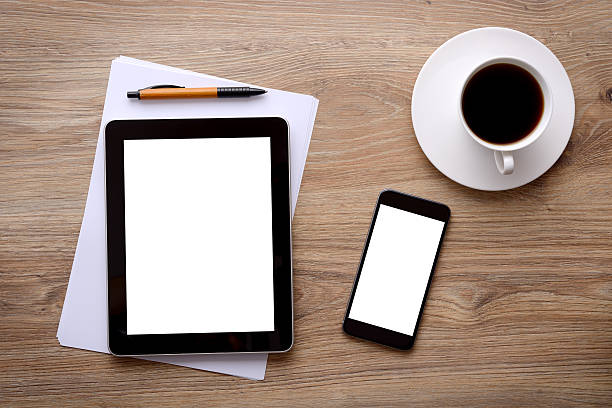 istock Touchscreen tablet pc and smart phone on office desk 508895022