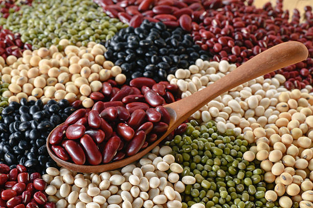 istock Choose a red bean on wooden spoon with lentils background 508897980