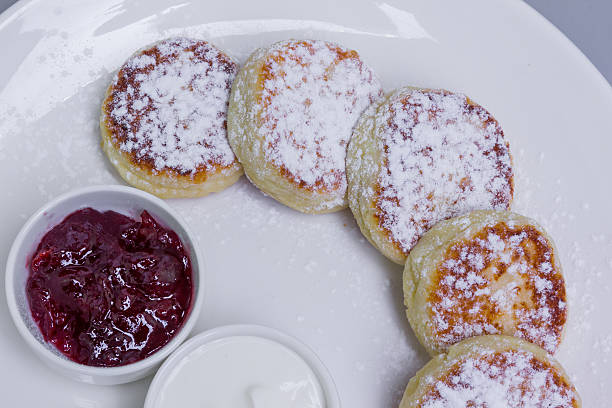 istock cheese pancakes with sour cream and jam 508898618