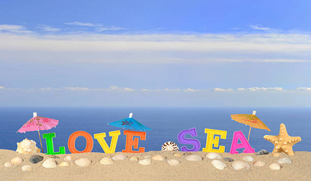 istock Love sea letters on a beach sand 508898762
