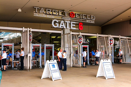 Minneapolis, MN, USA - July 26, 2015: Security people at Gate 6 into the baseball stadium at Target Field in Minneapolis MN, home of the Minnesota Twins
