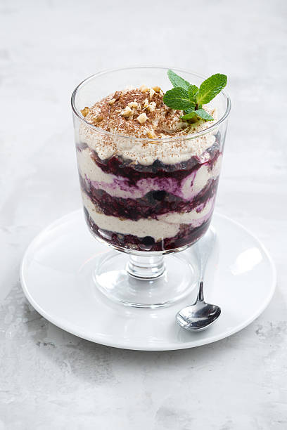 istock layered dessert with blueberries and cream, vertical 508899140
