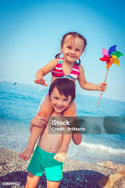 Children On The Beach Stock Photo - Download Image Now - 6-7 Years, Beach, Blond Hair