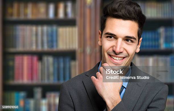 Portrait Of A Confident Man Smiling In His Office Copyspace Stock Photo - Download Image Now