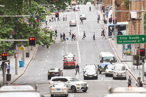 Color image of a busy Bridge Street near Circular Quay in Sydney.
