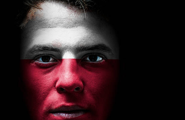 istock Poland. Polish flag on face 508904935
