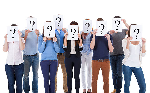 istock Diverse group of people holding question signs 508905243