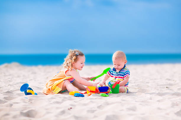 istock Cute kids playing on the beach 508906283