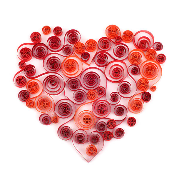Red heart curling paper on white Red heart curling paper on white paper quilling stock pictures, royalty-free photos & images