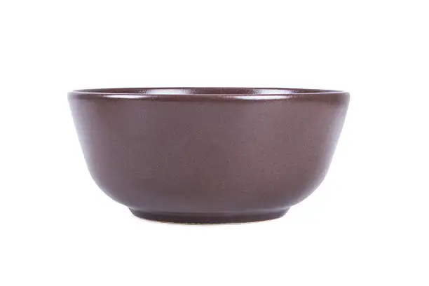 Side view of ceramic bowl, isolated on white background.