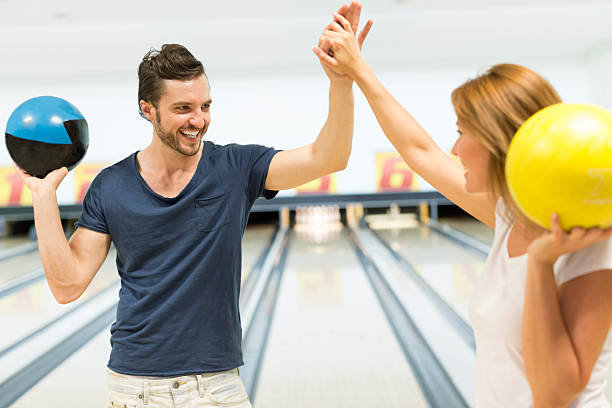 istock Cheerful Friends Bowling Together. 508907479