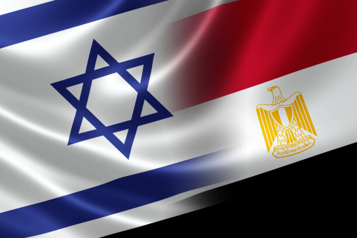 Merged Israeli and Egyptian flag on satin texture. Concept of the long political and sometimes tumultuous history between the two countries.