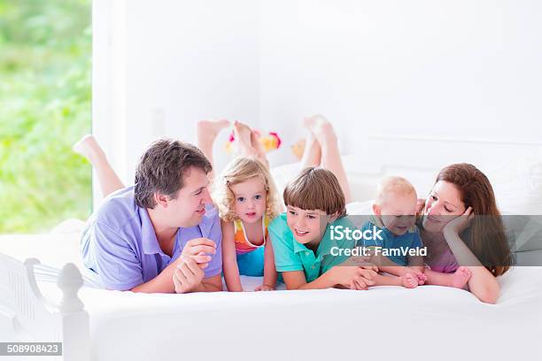 Big Happy Big Family In A Bed Stock Photo - Download Image Now - Adult, Baby - Human Age, Bed - Furniture