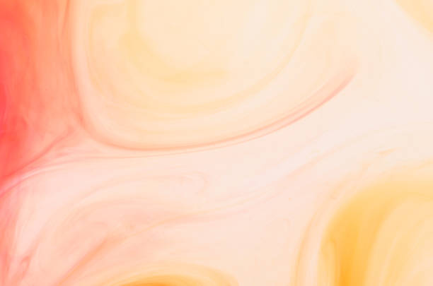 istock Swirling Red And Yellow Ink Abstract Background 508909519