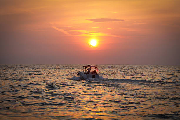 istock Silhouette Boat in the sea 508909847