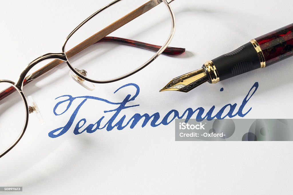 Testimonial Testimonial with pen and glasses. Thank You - Phrase Stock Photo