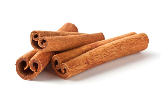 Fragrant cinnamon sticks isolated on white background