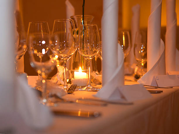 istock Wine glasses at a laid table 508913974