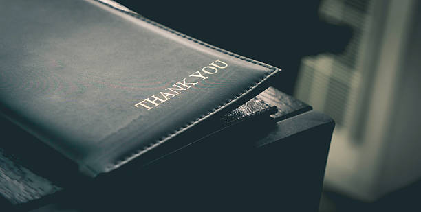 Restaurant Billing Tray with Letter "Thank You" stock photo