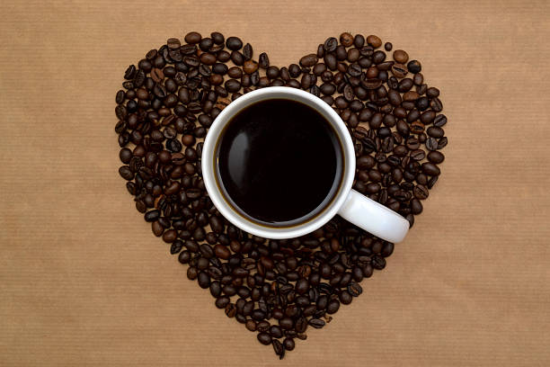 istock Hearts shaped coffee beans and a cup of coffee 508916160