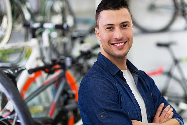 istock Man in bike shop 508916186