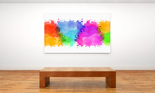 Canvas splattered with a colorful splash of vibrant paints hanging on a wall inside a private space or museum gallery, with a wooden bench in front of it. Bright illumination with white walls and brown parquet floor. Creativity, vitality and ideas in art products and indoor spaces: painting show all colors of the spectrum, like a painted rainbow. Front view. Digitally generated image.