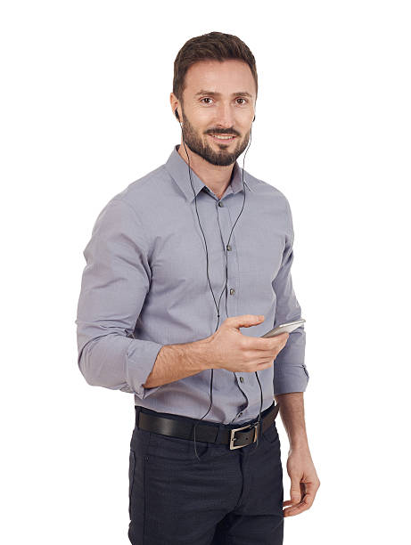 istock Businessman with mobile phone and headphones 508917900