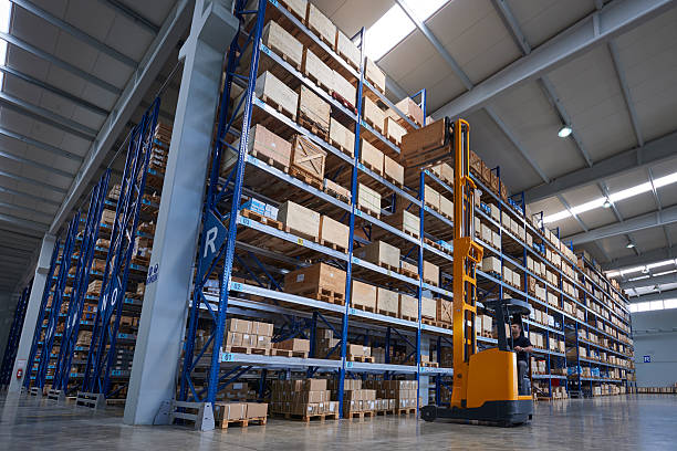 istock Forklift carrying cardboard box in warehouse. 508918678